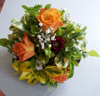 Fruit Twist - Tangerine Roses and other gorgeous blooms make up an incredible sight to behold for any and all occasions - order for delivery today or any day